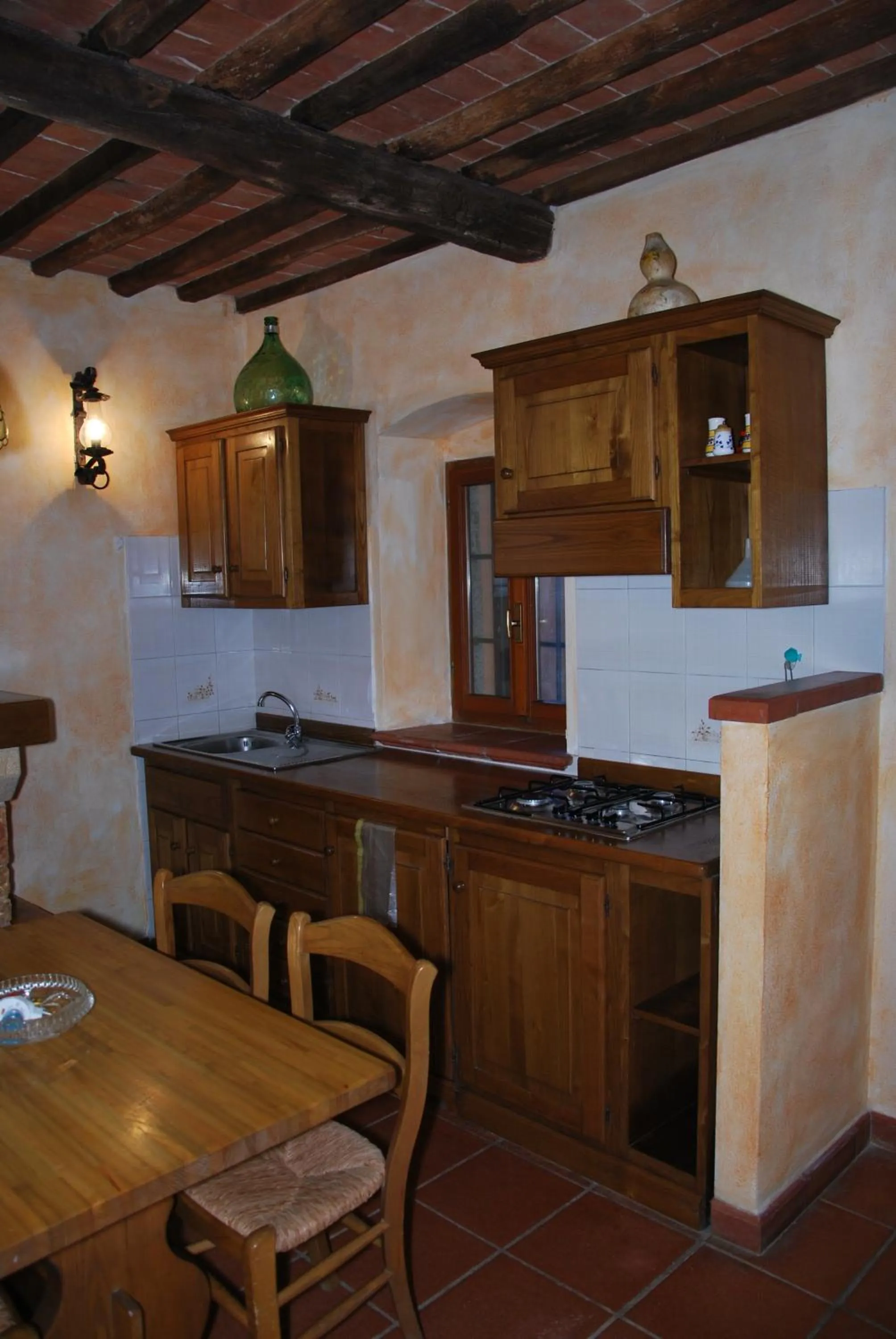 Kitchen or kitchenette in Casa Rosada - Piscina, aria condizionata, terrazze e posti auto