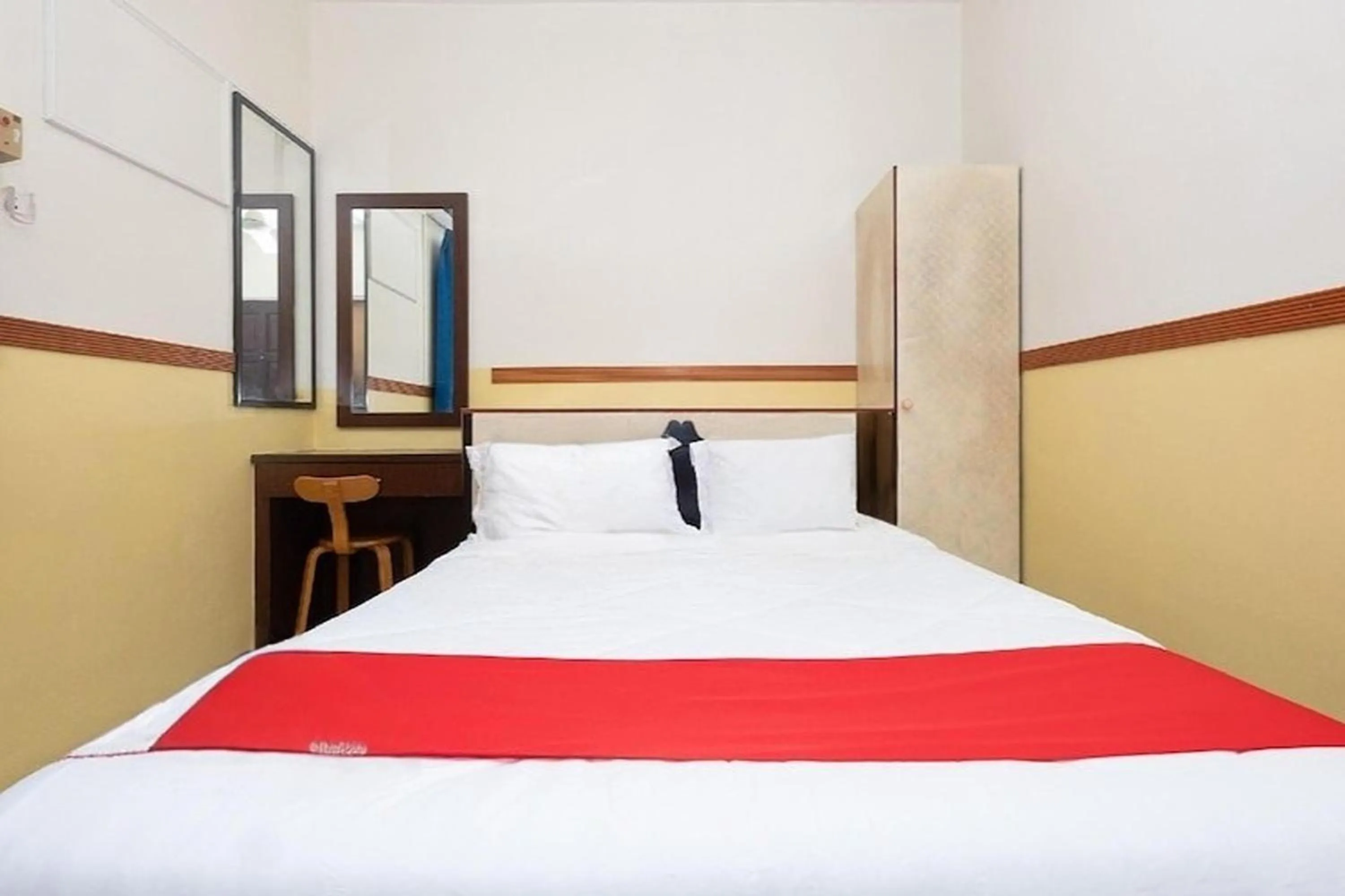 Bed in Lumut Villa Inn