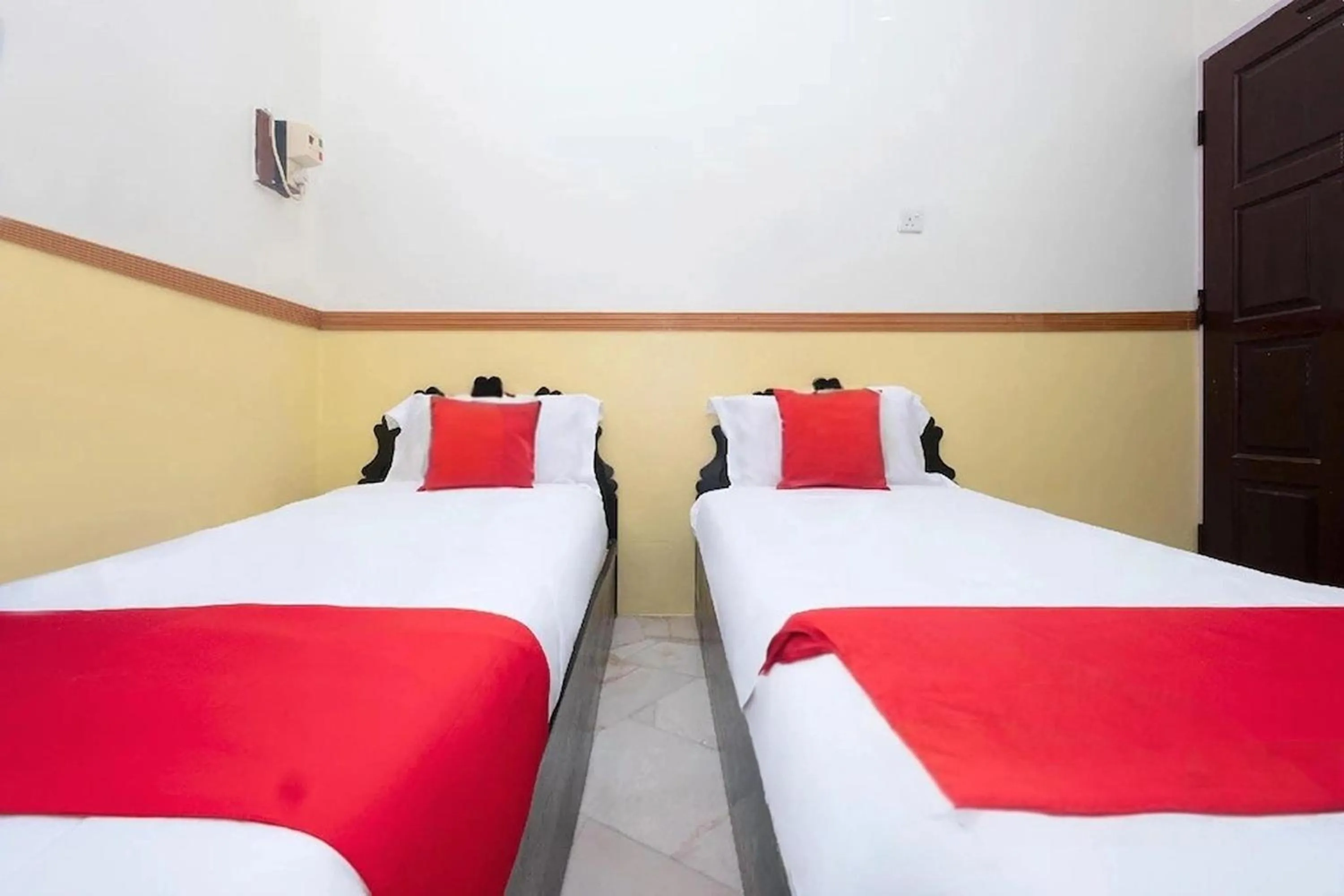 Bed in Lumut Villa Inn