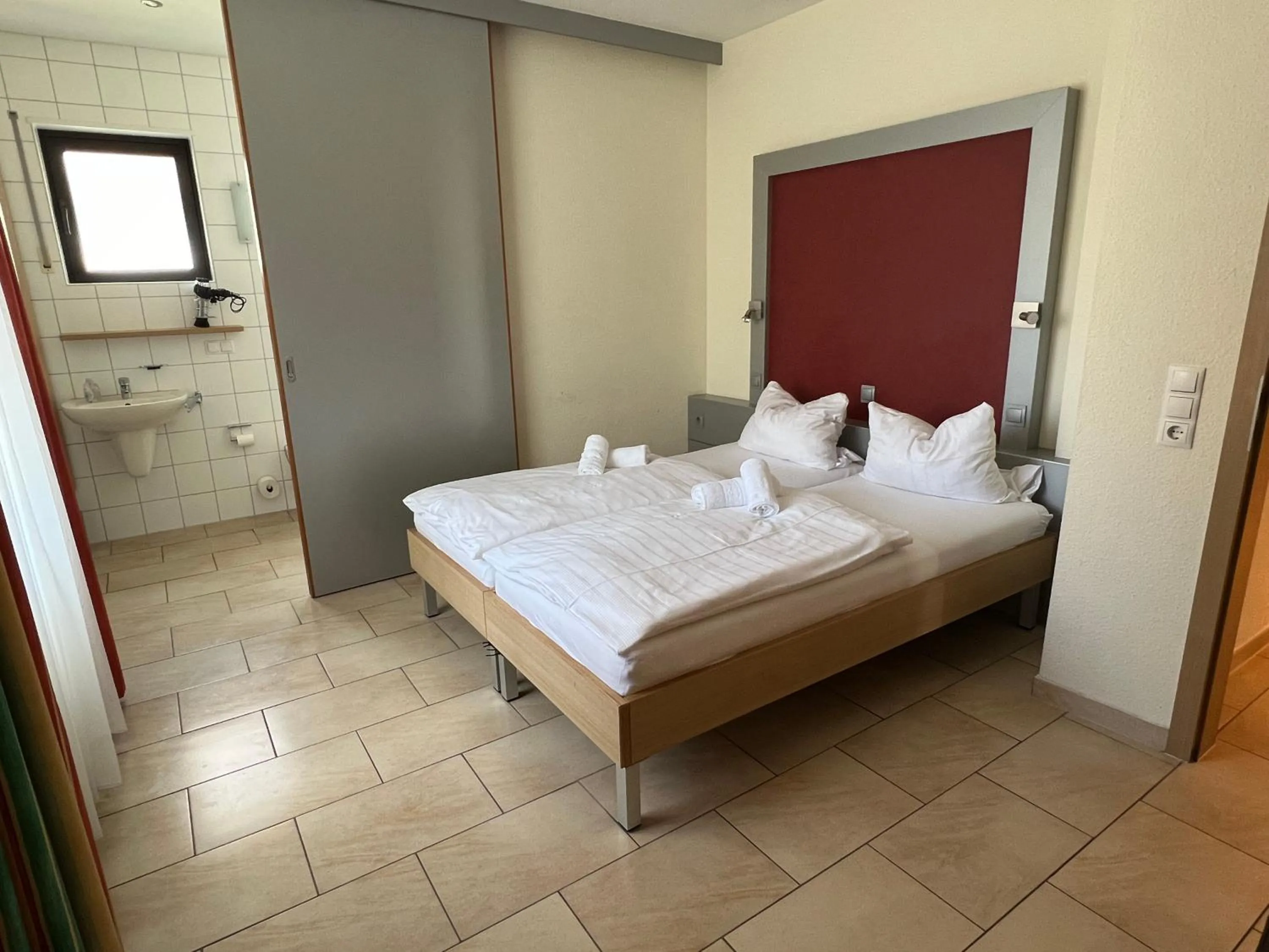 Bed in Hotel Pfälzer Hof