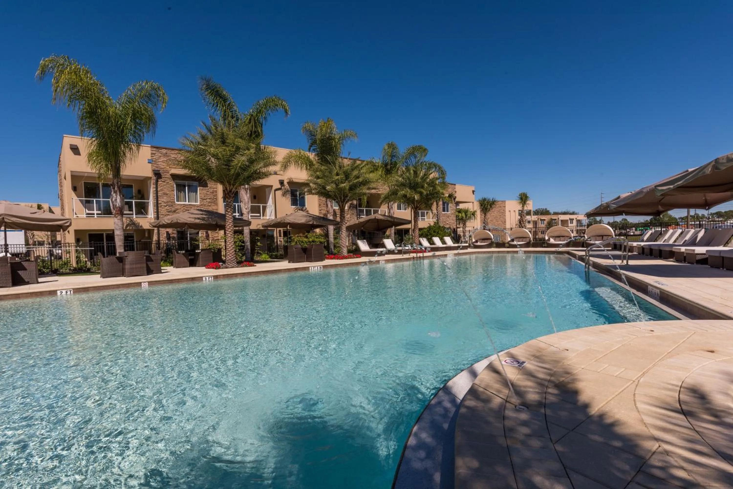 Swimming pool in Magic Village Yards Trademark Collection by Wyndham