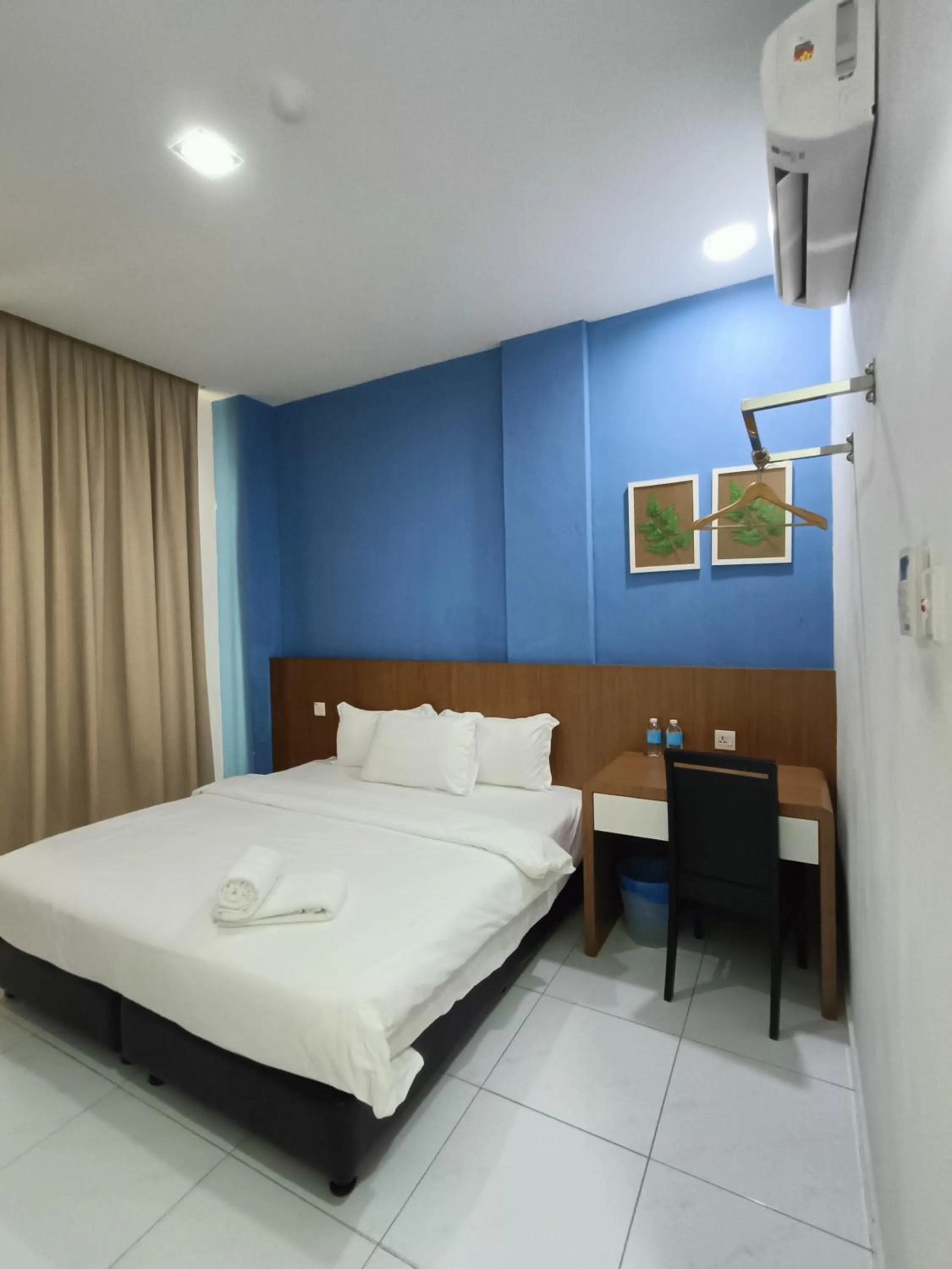 Bed in Hotel Wawasan