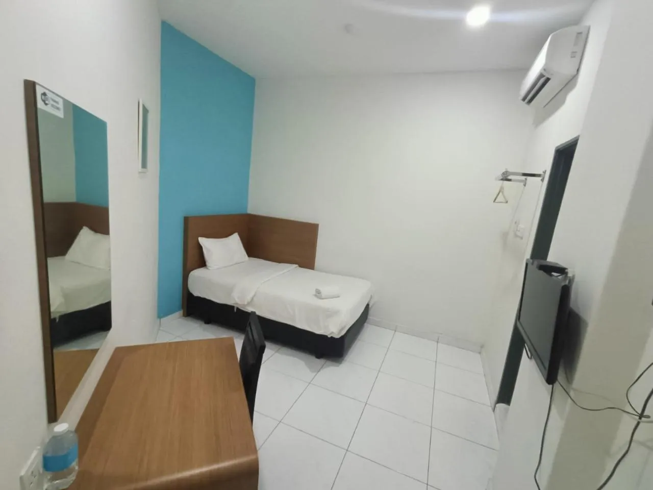 Bed in Hotel Wawasan