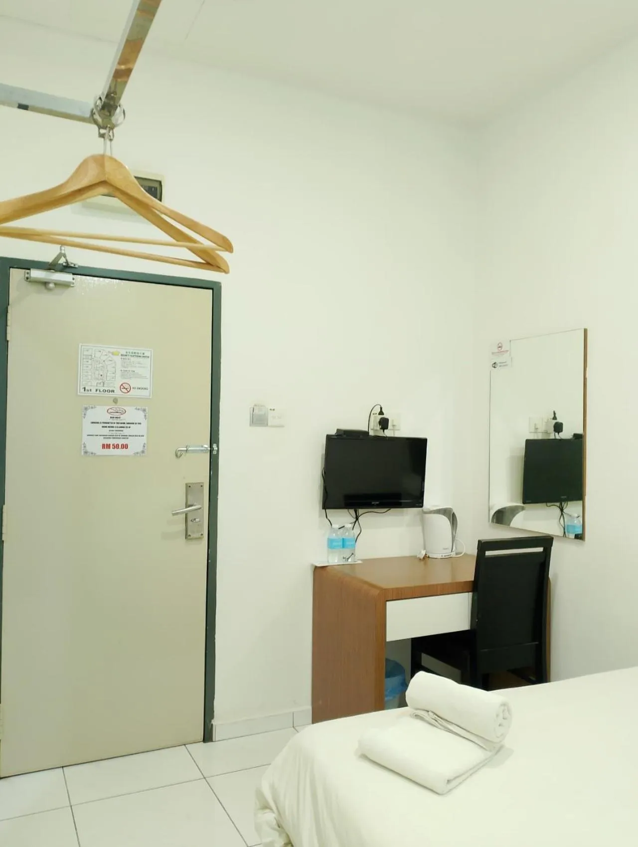 Bed in Hotel Wawasan