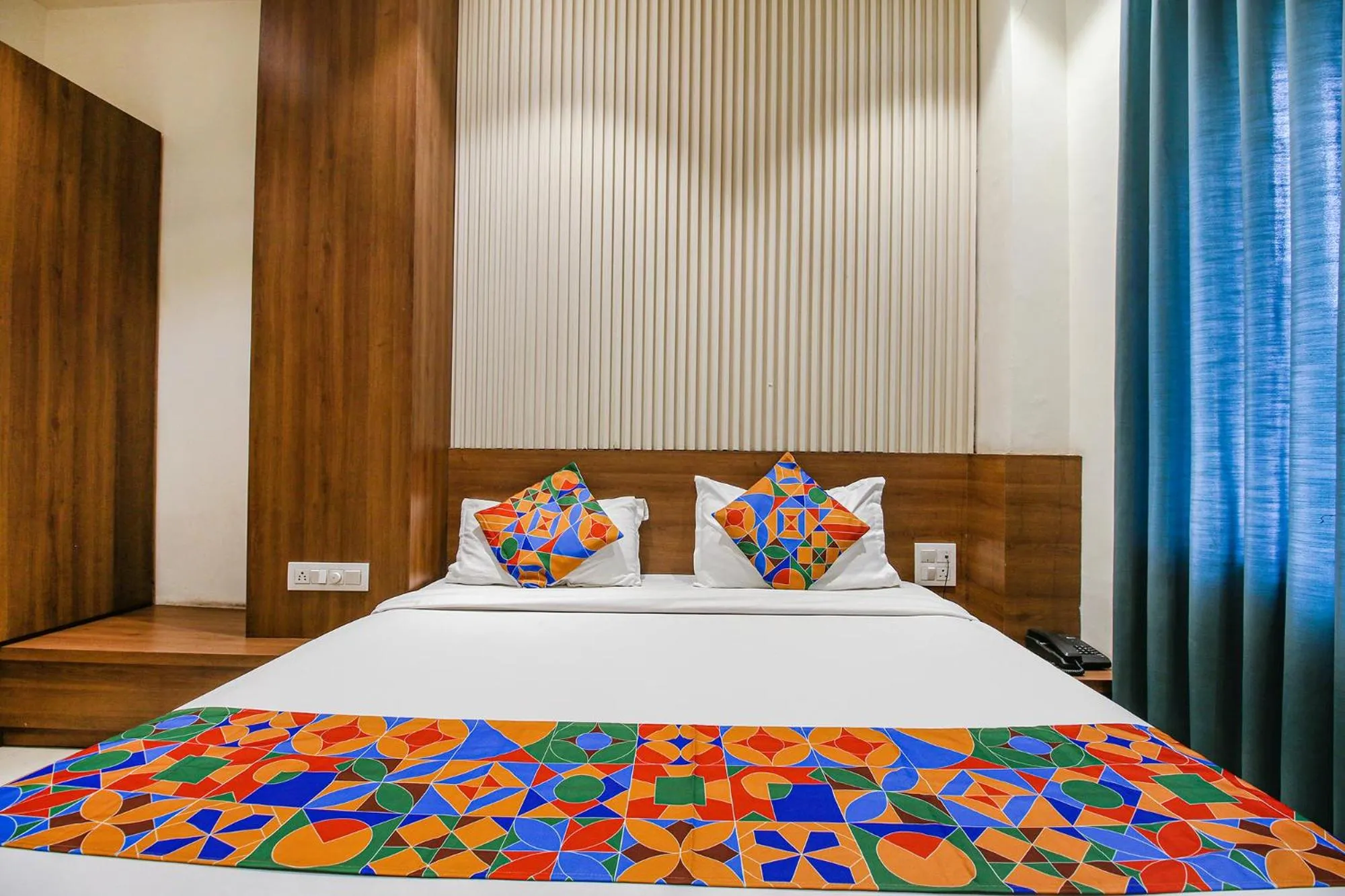 Bed in FabHotel Royal Palace II