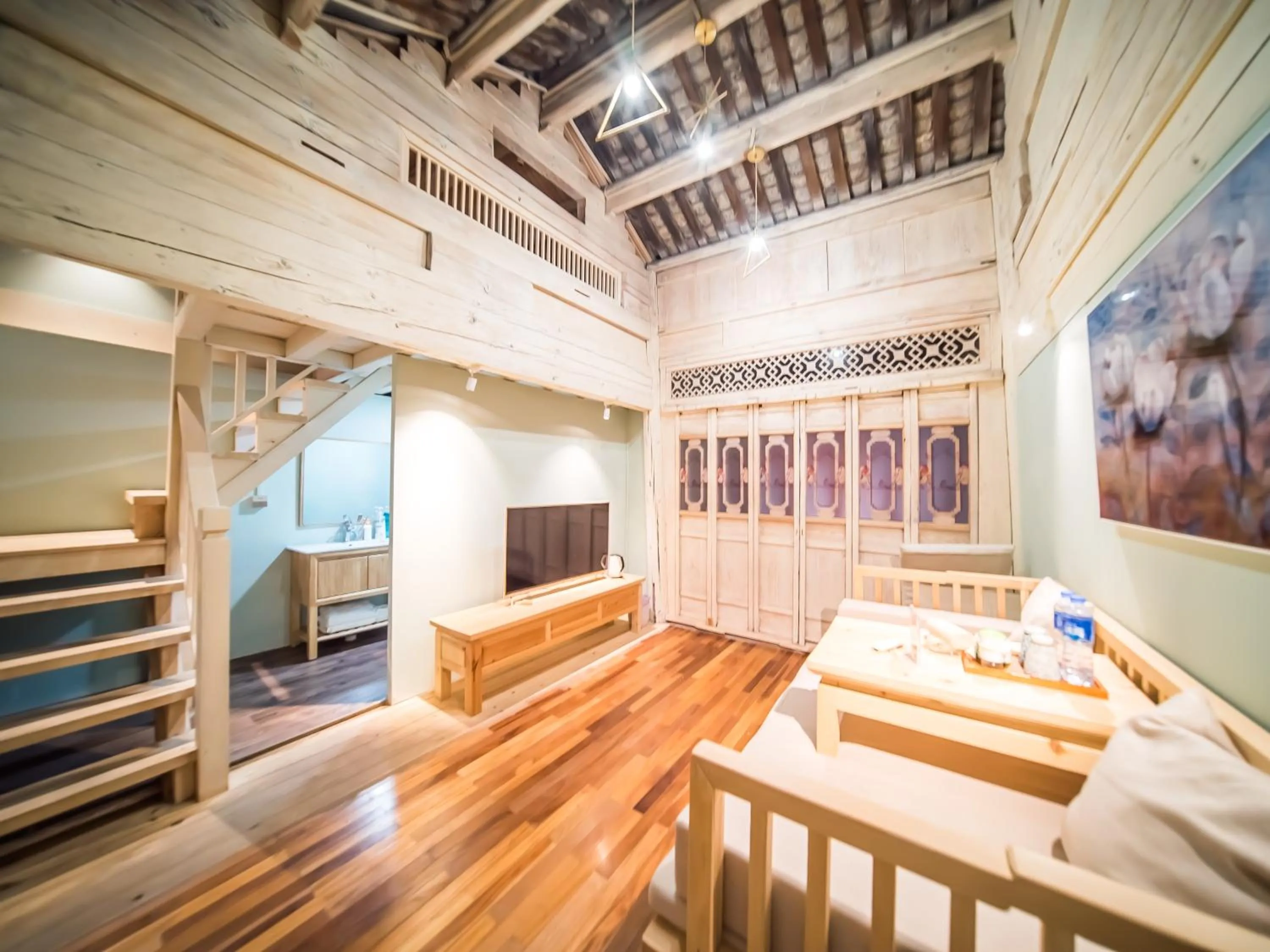 Living room, Bed in Tuo Tuo Guest House