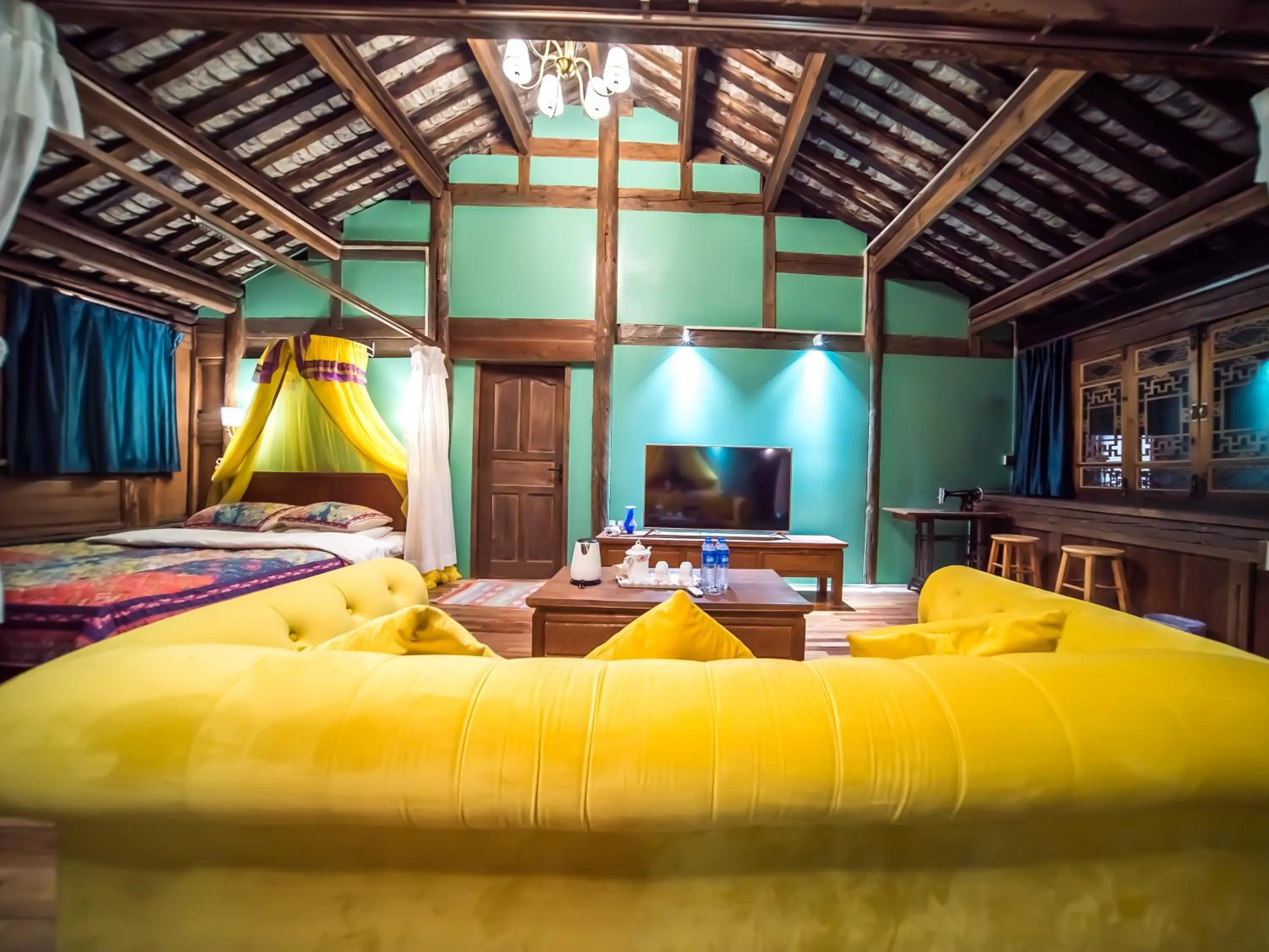 Living room, Bed in Tuo Tuo Guest House