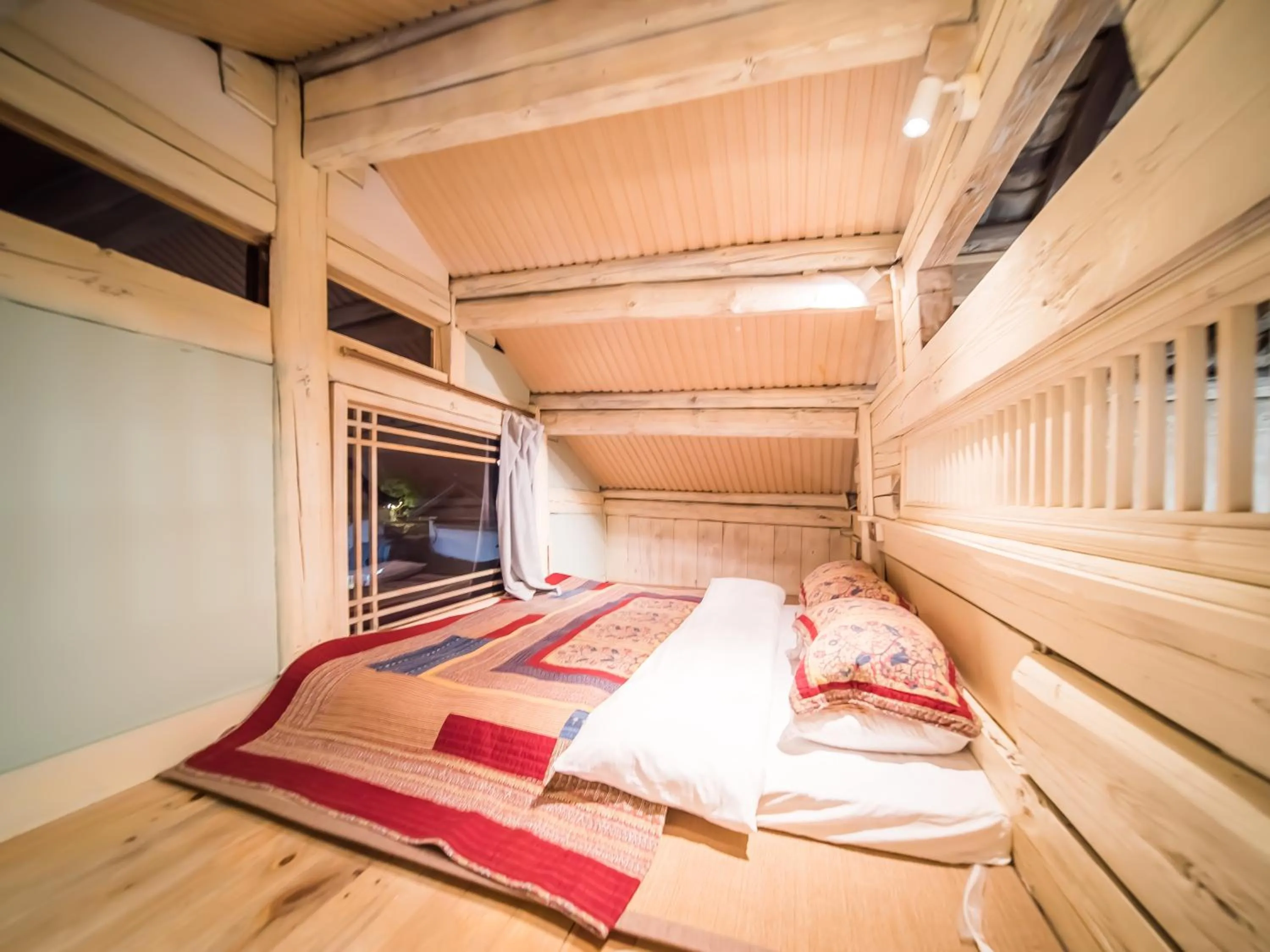 Bed in Tuo Tuo Guest House