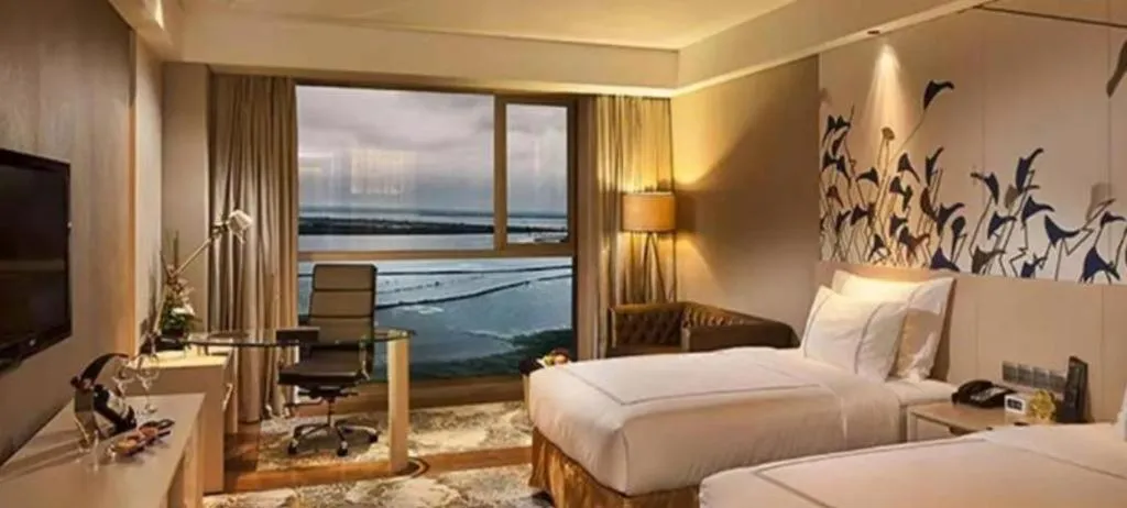 Bed in Grand Skylight International Hotel Gongqingcheng