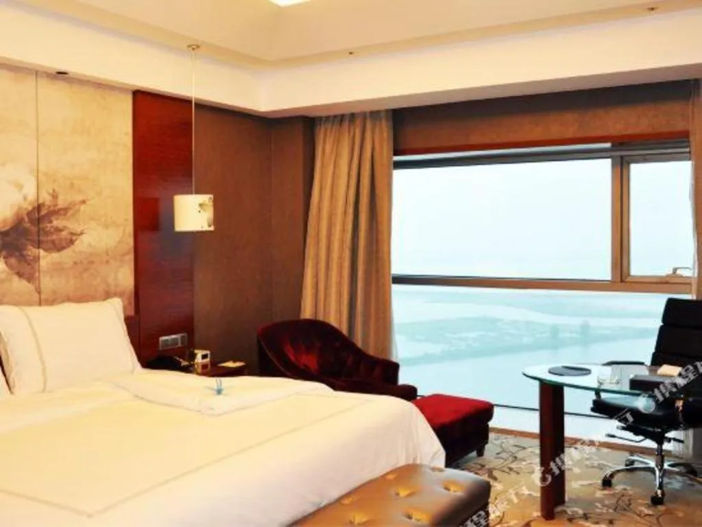 Bed in Grand Skylight International Hotel Gongqingcheng