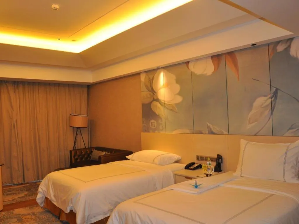 Bed in Grand Skylight International Hotel Gongqingcheng
