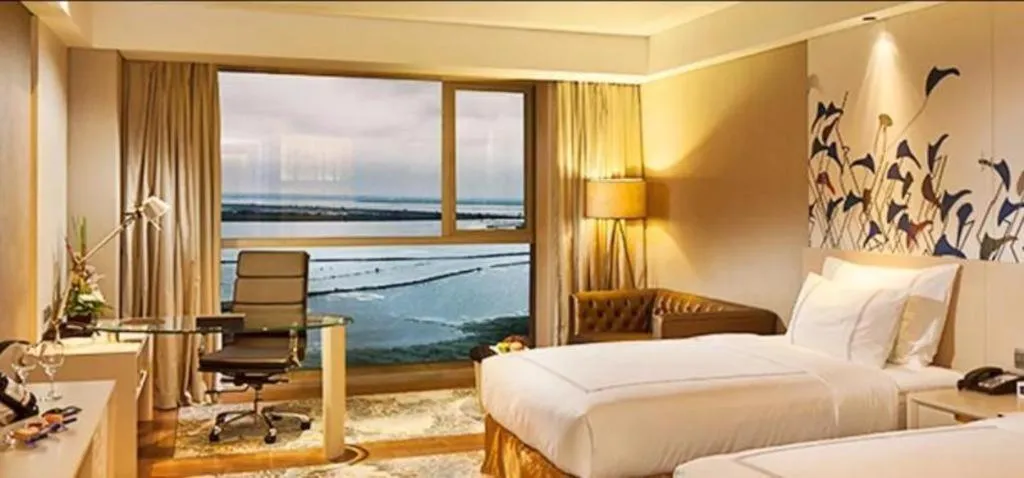 Bed in Grand Skylight International Hotel Gongqingcheng