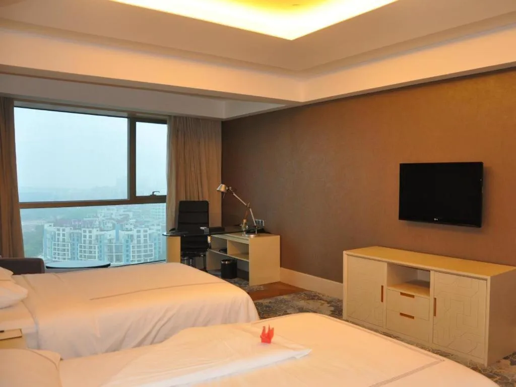 Bed in Grand Skylight International Hotel Gongqingcheng