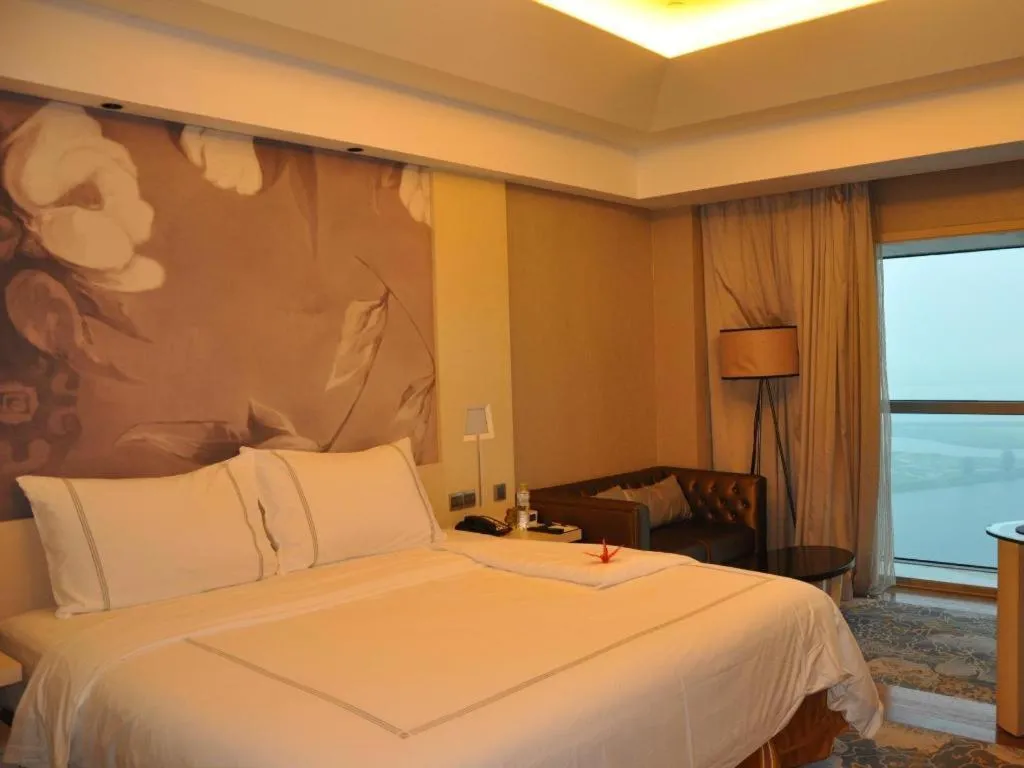 Bed in Grand Skylight International Hotel Gongqingcheng