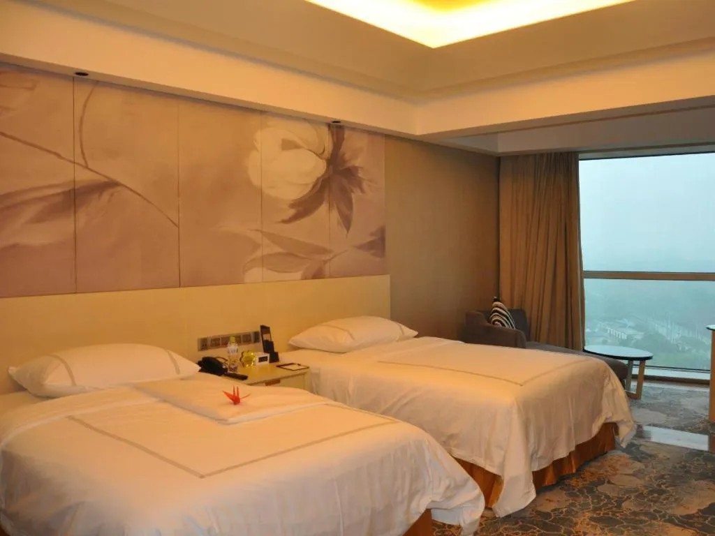 Bed in Grand Skylight International Hotel Gongqingcheng