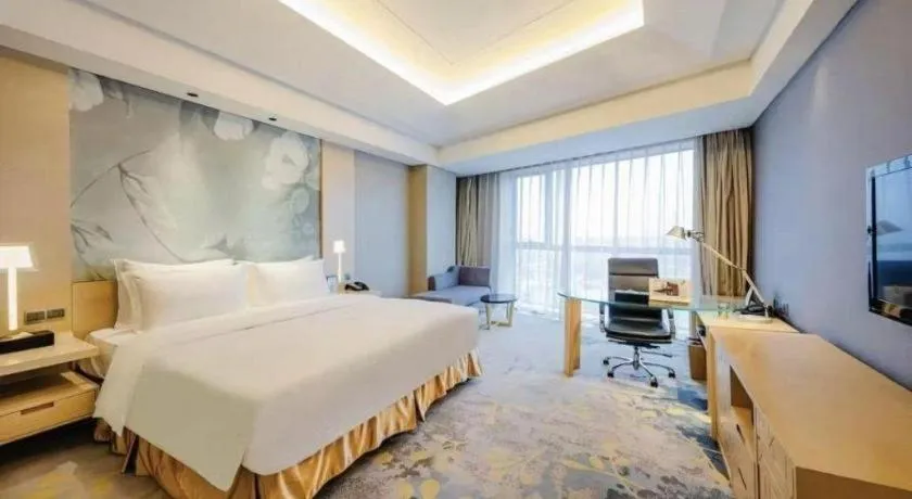Bed in Grand Skylight International Hotel Gongqingcheng