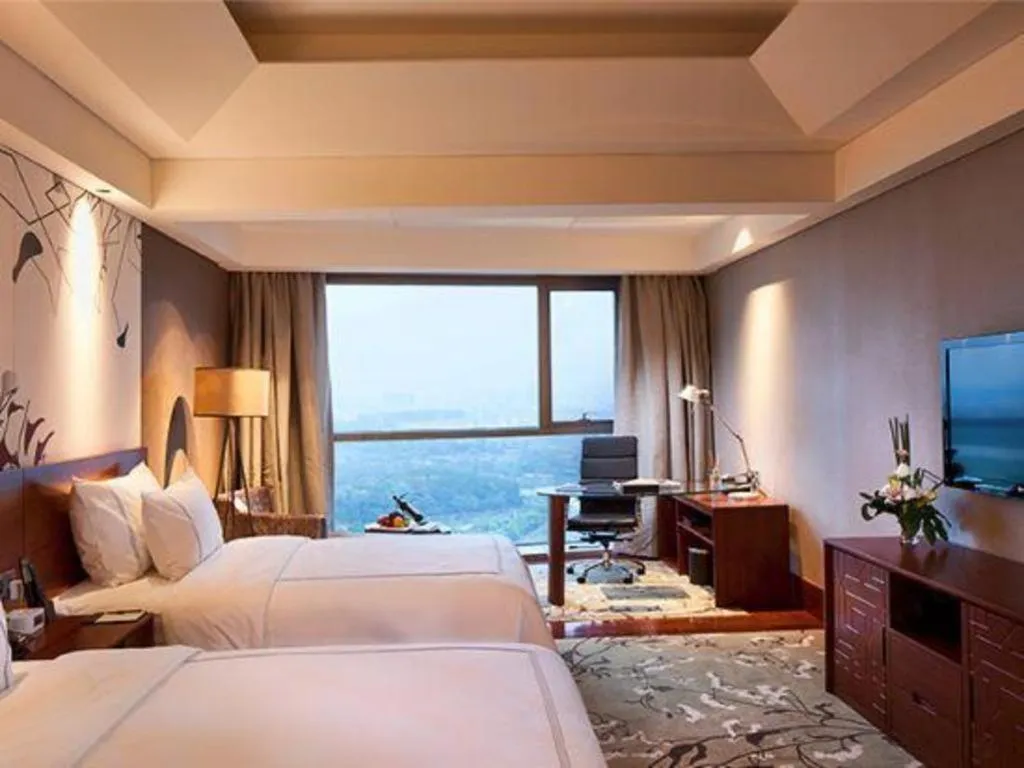 Bed in Grand Skylight International Hotel Gongqingcheng