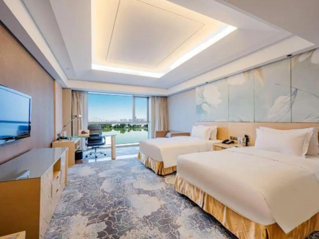 Bed in Grand Skylight International Hotel Gongqingcheng