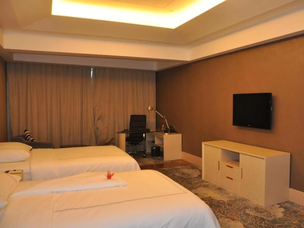 Bed in Grand Skylight International Hotel Gongqingcheng