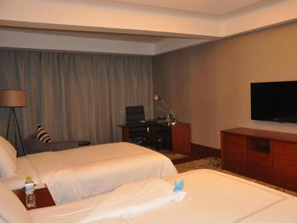 Bed in Grand Skylight International Hotel Gongqingcheng