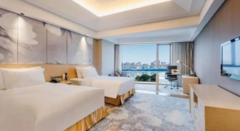 Bed in Grand Skylight International Hotel Gongqingcheng