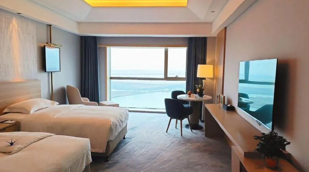 Bed in Grand Skylight International Hotel Gongqingcheng