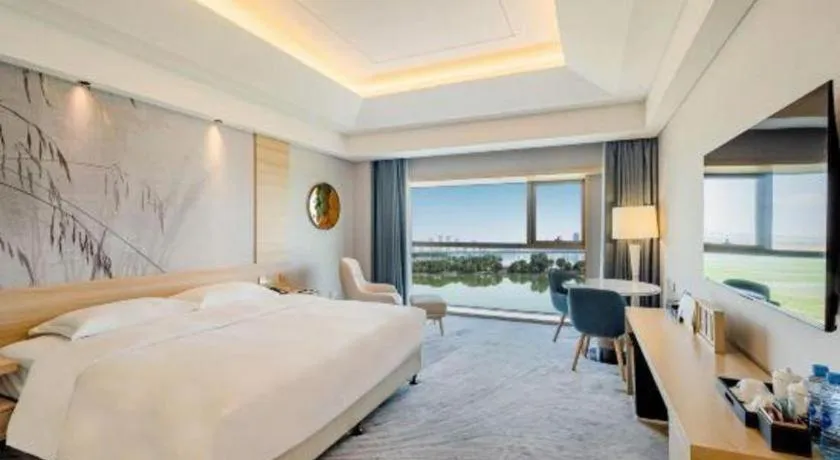 Bed in Grand Skylight International Hotel Gongqingcheng