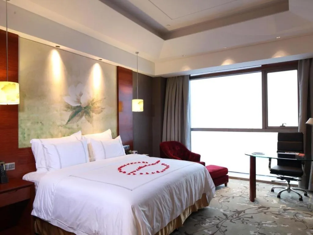 Bed in Grand Skylight International Hotel Gongqingcheng