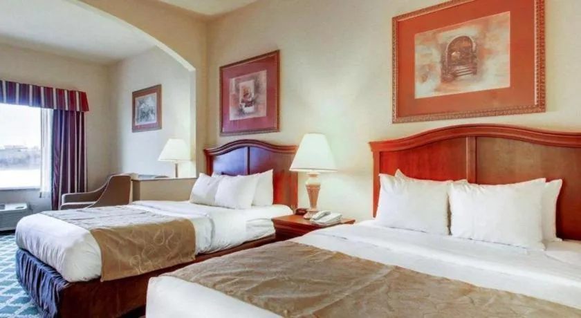 Bed in Clarion Suites Vidalia Riverfront