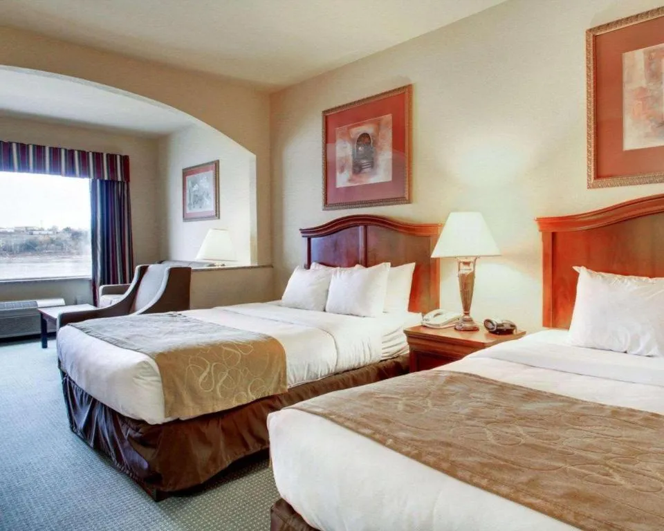 Bed in Clarion Suites Vidalia Riverfront