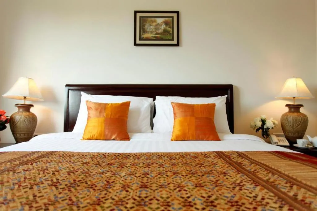 Bed in Lao Golden Hotel