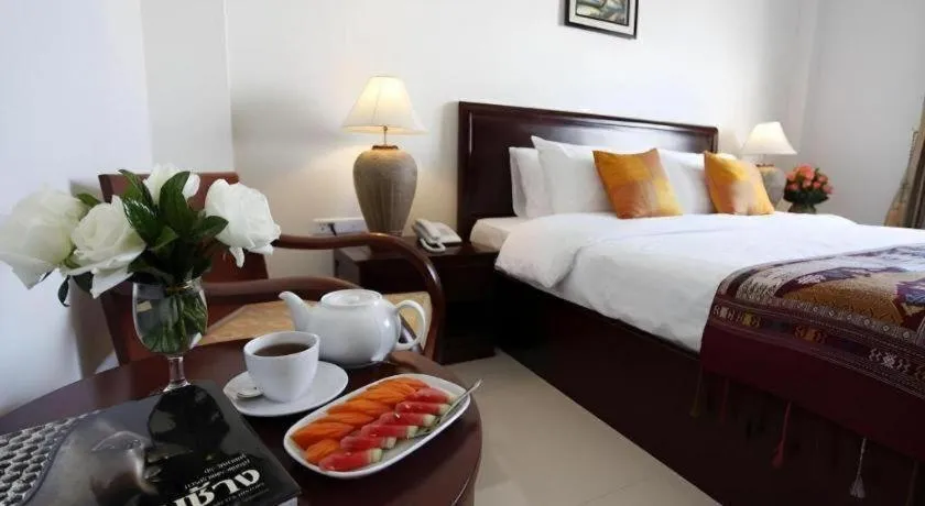 Bed in Lao Golden Hotel