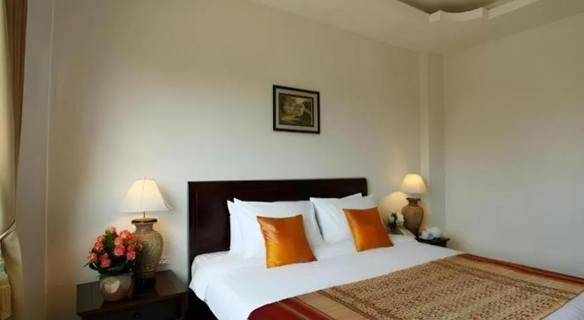 Bed in Lao Golden Hotel