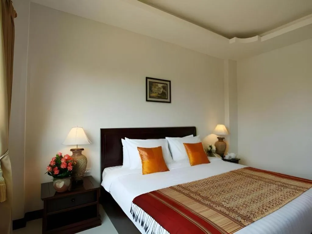 Bed in Lao Golden Hotel