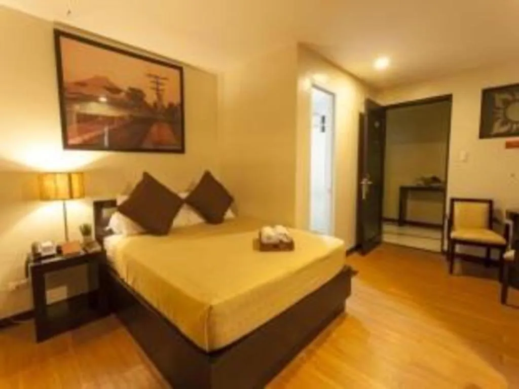 Bed in L Square Hotel