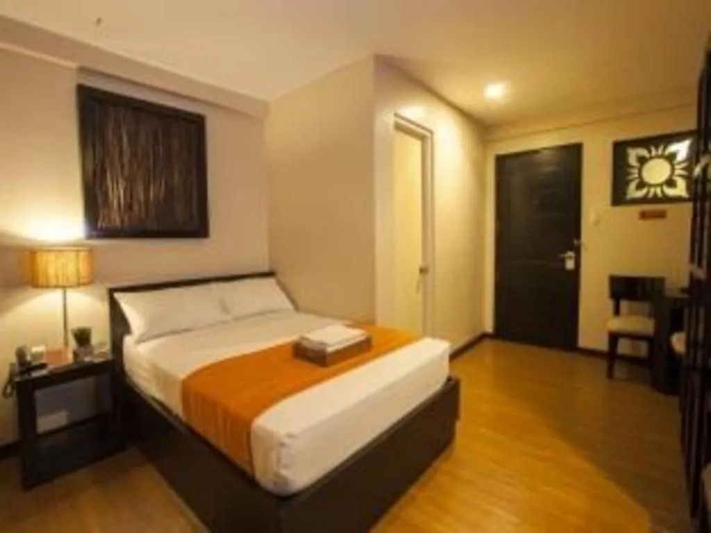 Bed in L Square Hotel