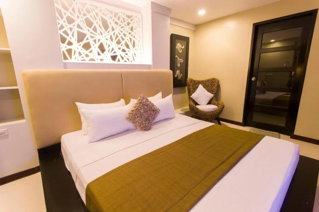 Bed in L Square Hotel