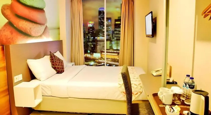 Bed in Clay Hotel Jakarta