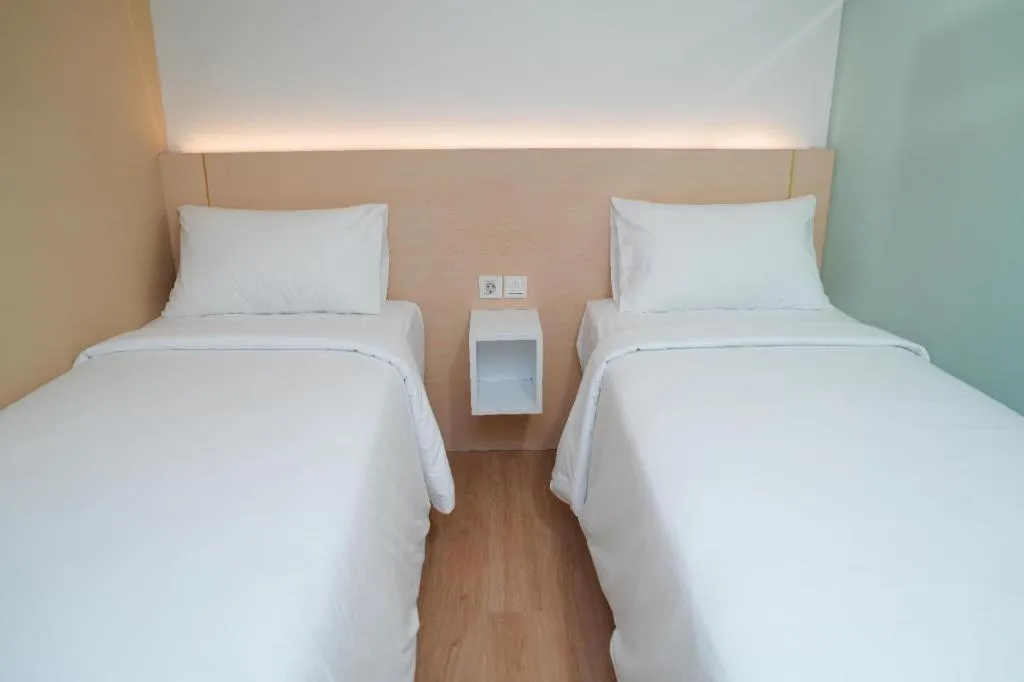 Bed in Clay Hotel Jakarta