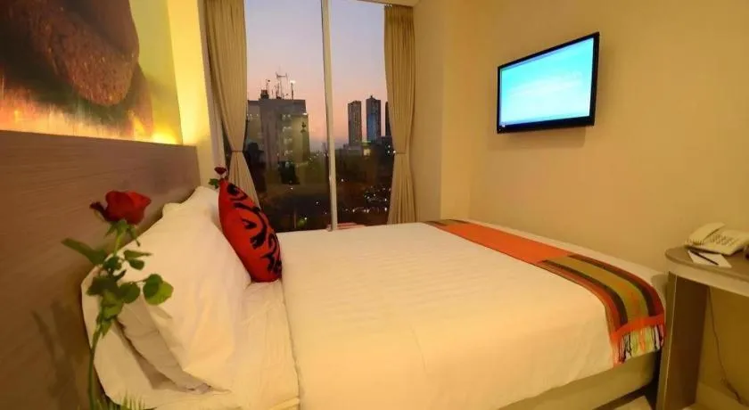 Bed in Clay Hotel Jakarta