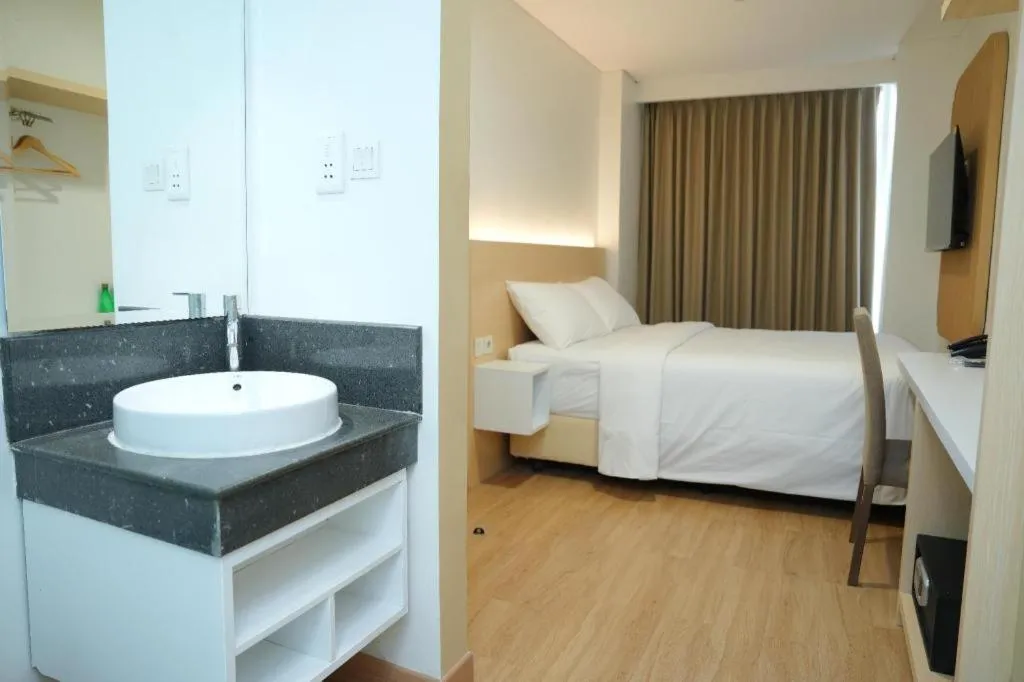 Bed in Clay Hotel Jakarta
