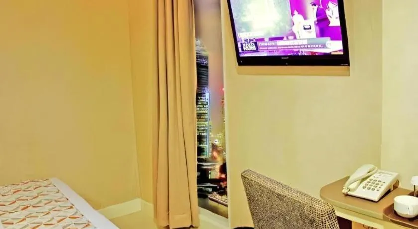 Bed in Clay Hotel Jakarta