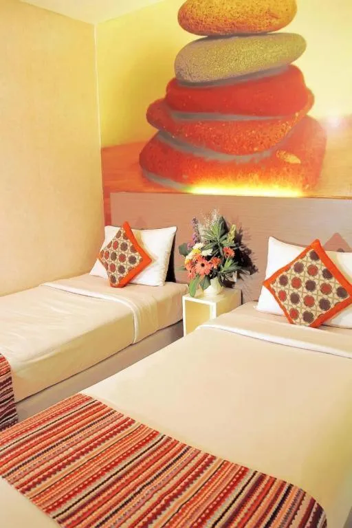 Bed in Clay Hotel Jakarta