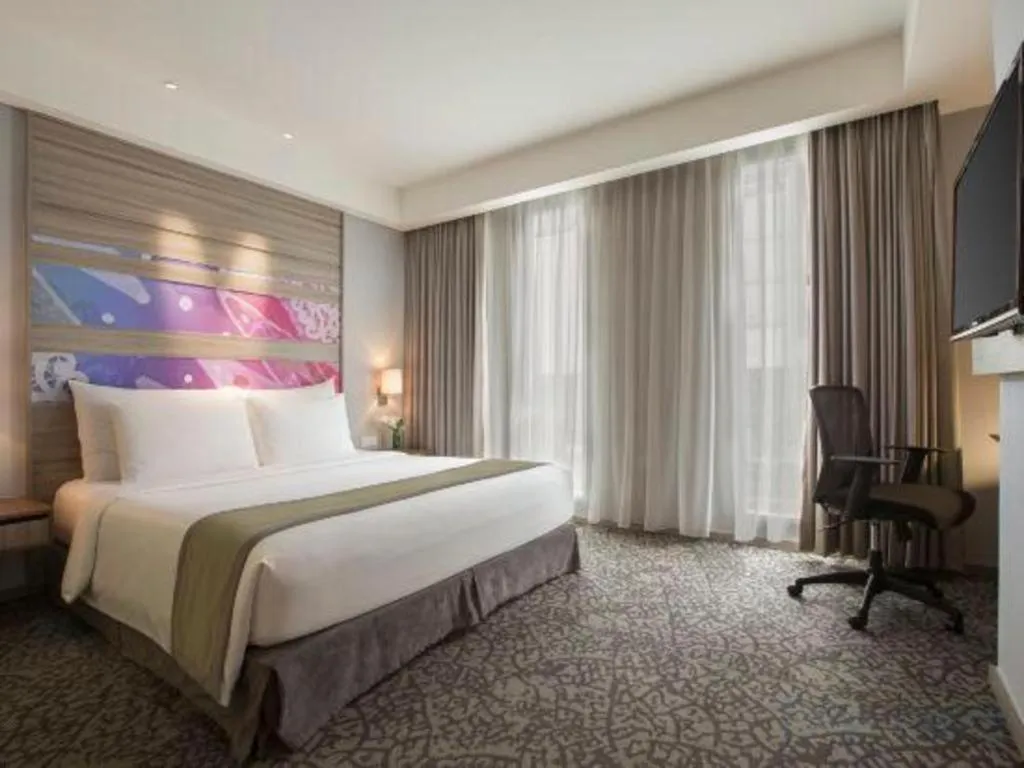 Bed in Hotel GranDhika Iskandarsyah