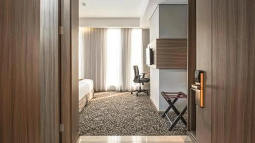 Bed in Hotel GranDhika Iskandarsyah