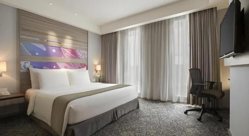 Bed in Hotel GranDhika Iskandarsyah