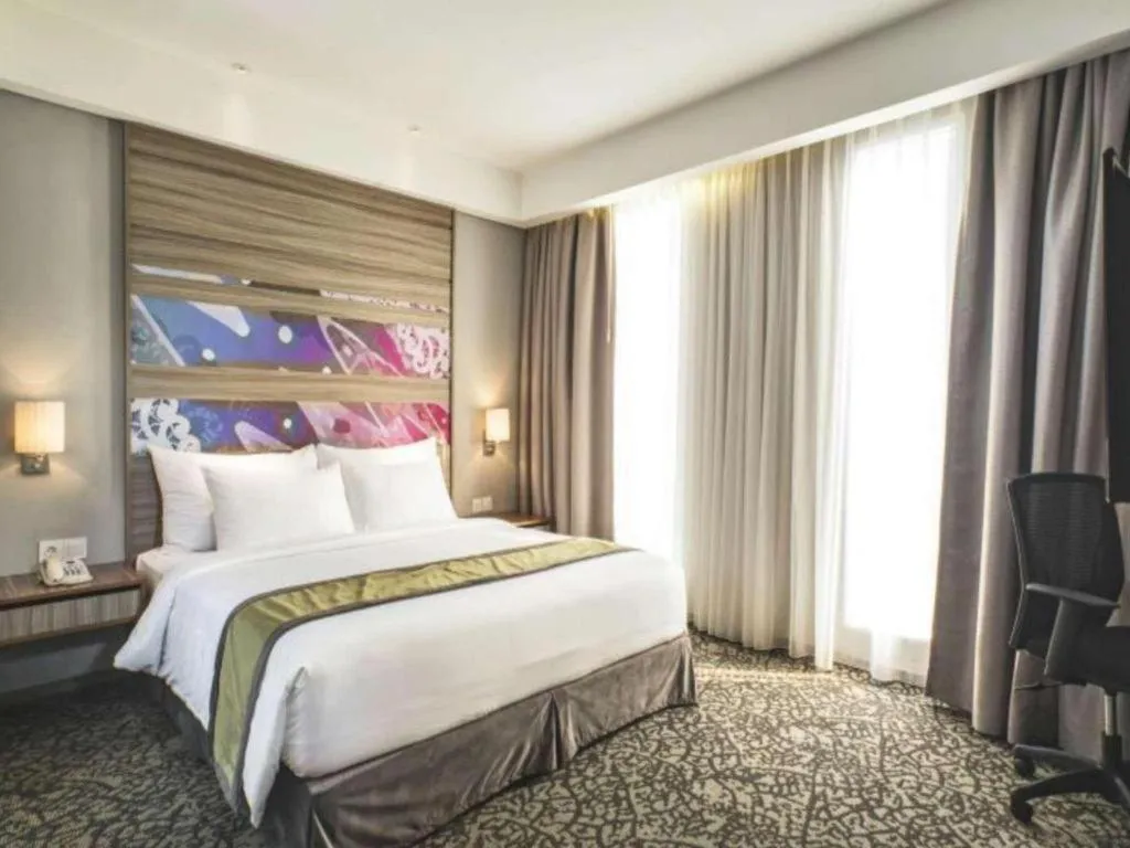 Bed in Hotel GranDhika Iskandarsyah