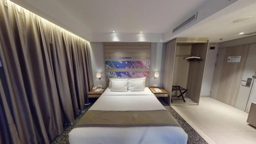 Bed in Hotel GranDhika Iskandarsyah