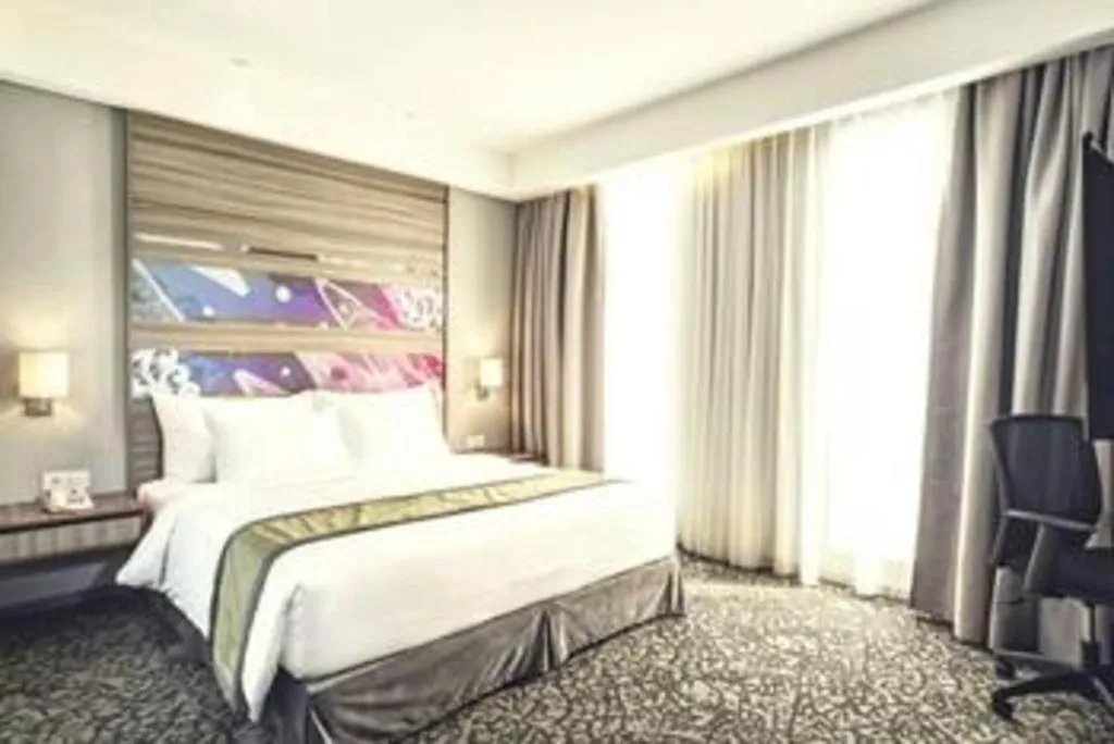 Bed in Hotel GranDhika Iskandarsyah