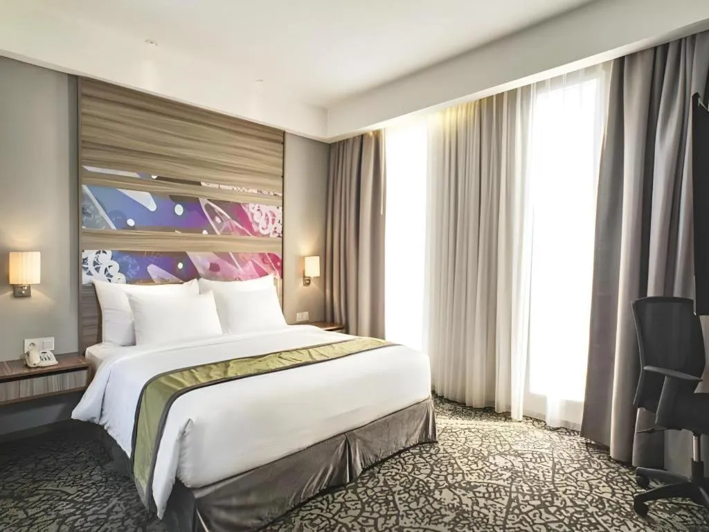 Bed in Hotel GranDhika Iskandarsyah